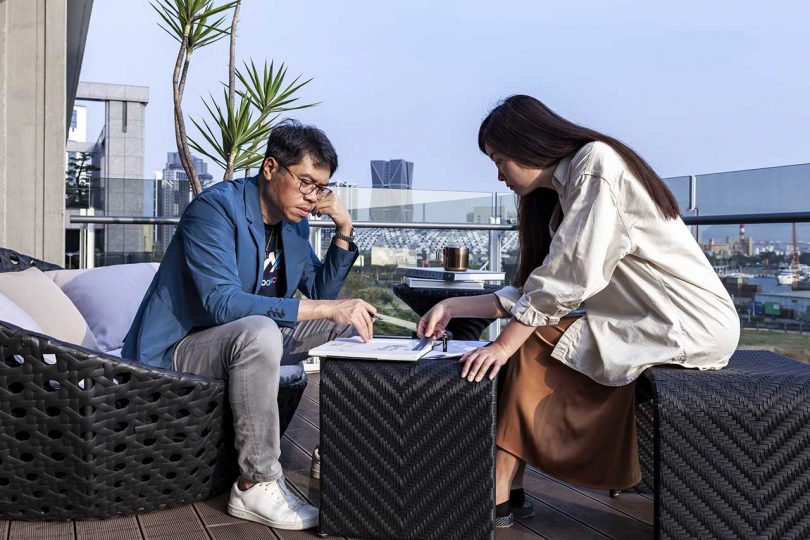 architects working on outdoor terrace