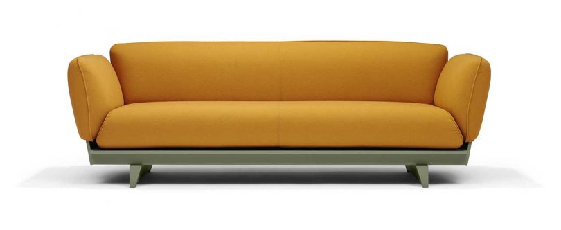 FLOAT SOFA in ocre fabric with green base