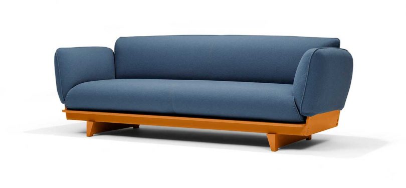 FLOAT SOFA in blue fabric with ocre base