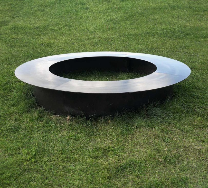 metal ring bench mockup in grass