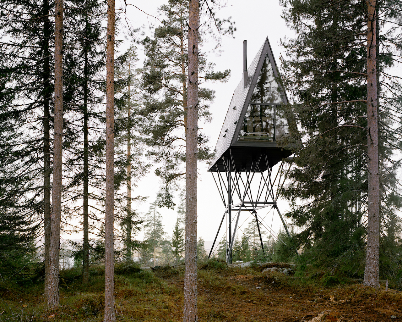 A-Frame PAN Cabins on Stilts Let You Cozy Up in the Treetops of a Finnish Forest