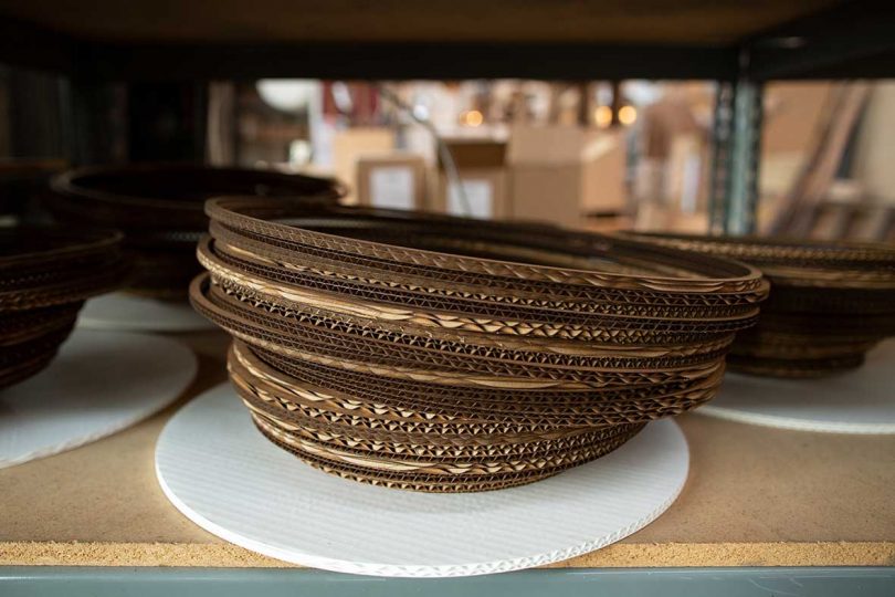 stacks of cardboard bands on shelf