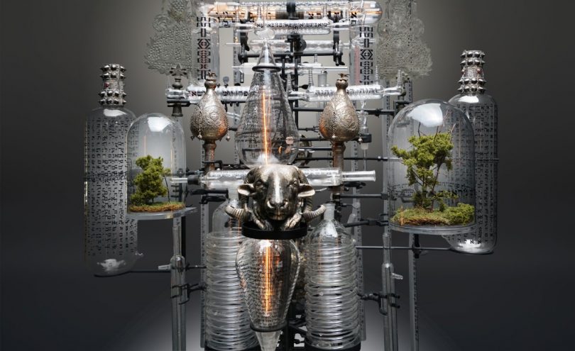 Two model trees and a rams head in "Day V B" sculpture
