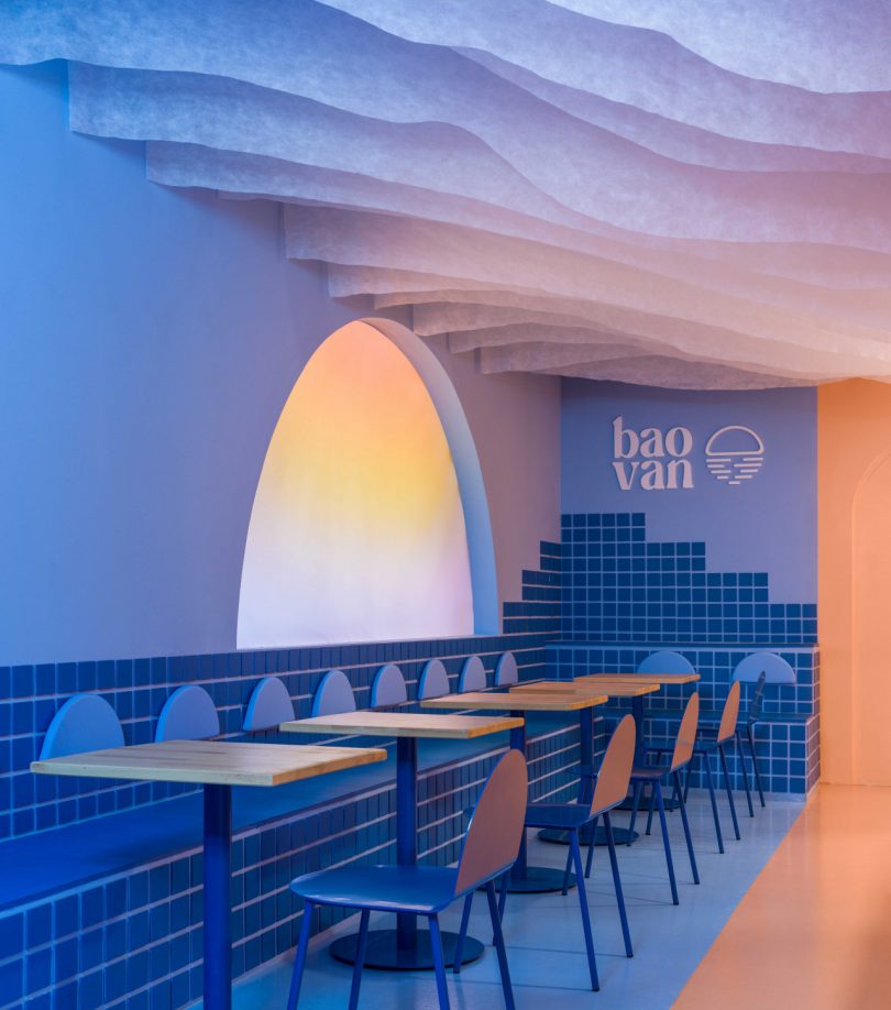 modern restaurant interior featuring blue and peach tones