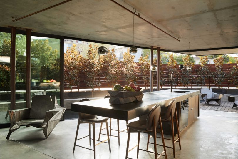 interior view of modern kitchen looking out to greenery