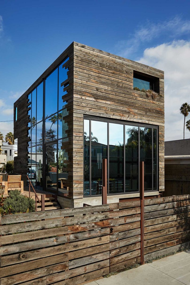 exterior view of modern guesthouse with aged wood exterior