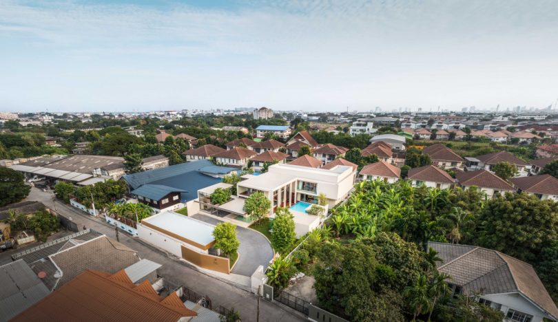 drone shot from a distance of modern home's compound in Bangkok