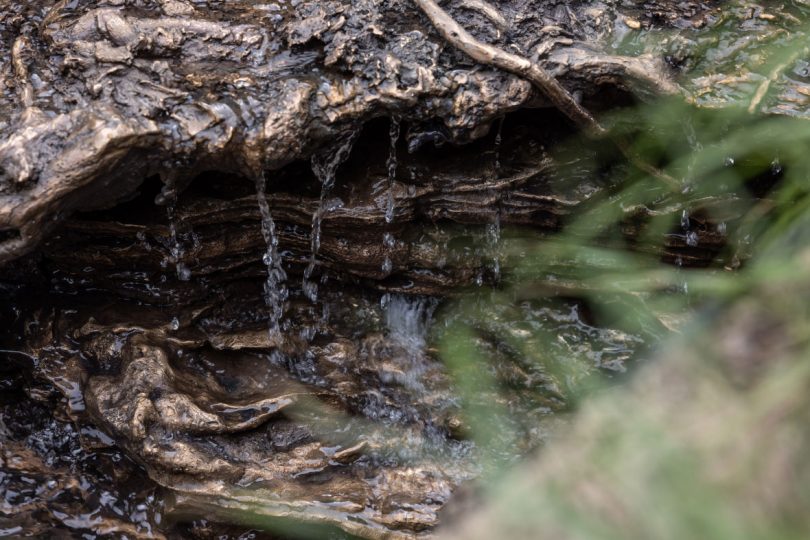 Water falls over Landscape and Memory sculpture (detail)