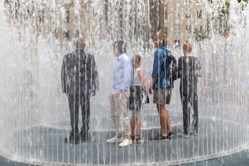 A group huddles together in Changing Spaces