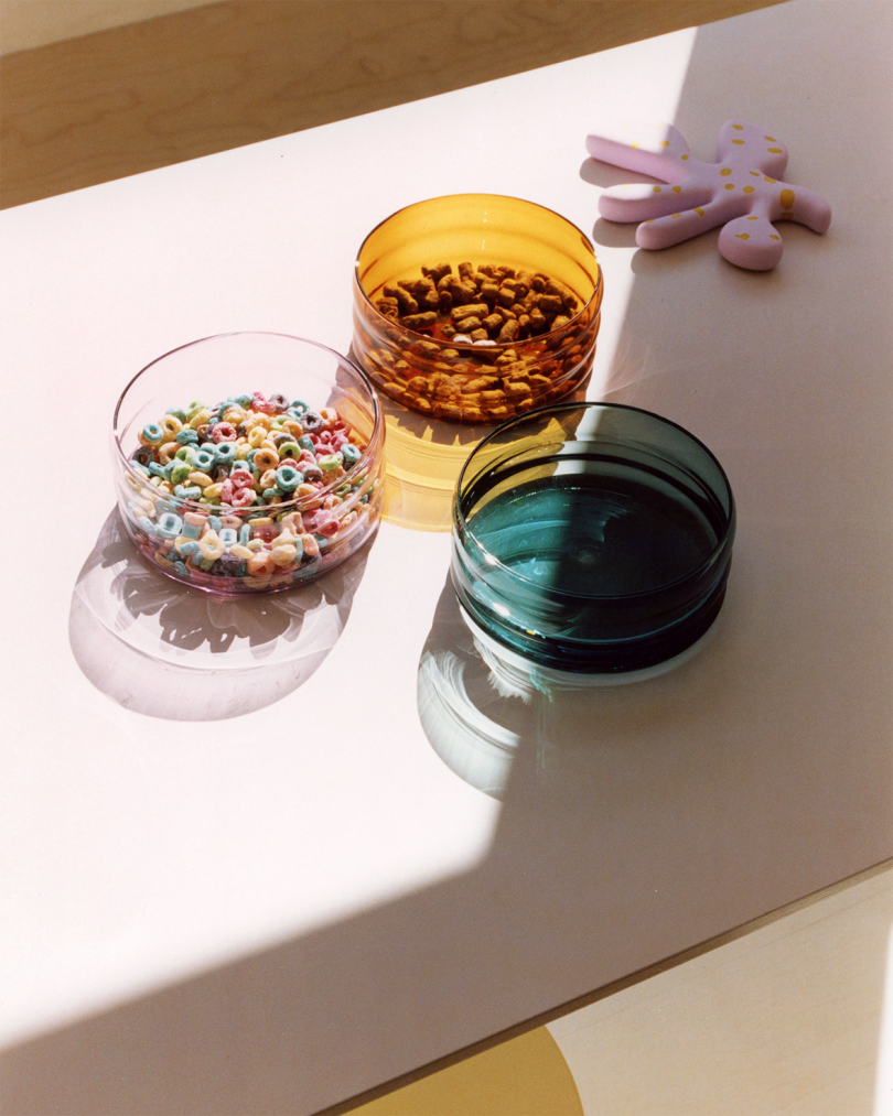 three colored glass bowls