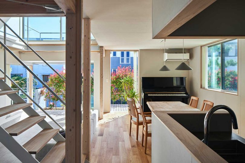 interior of modern Japanese house with views through kitchen to living area