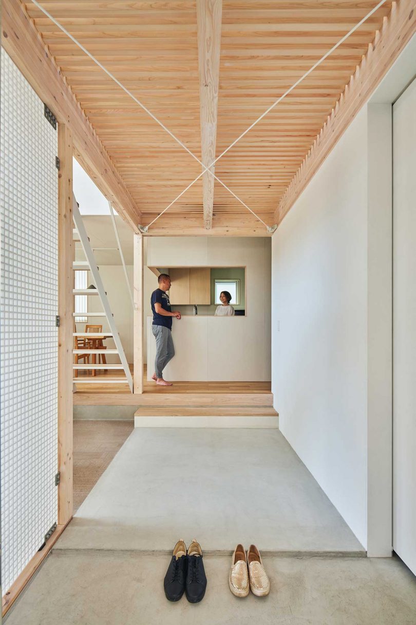 interior of modern Japanese home with pathway to back kitchen