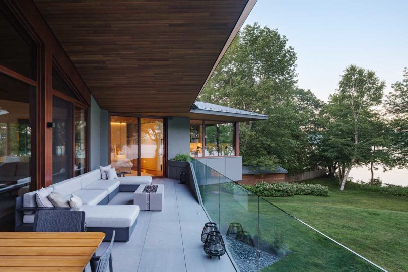 evening view of modern home exterior deck