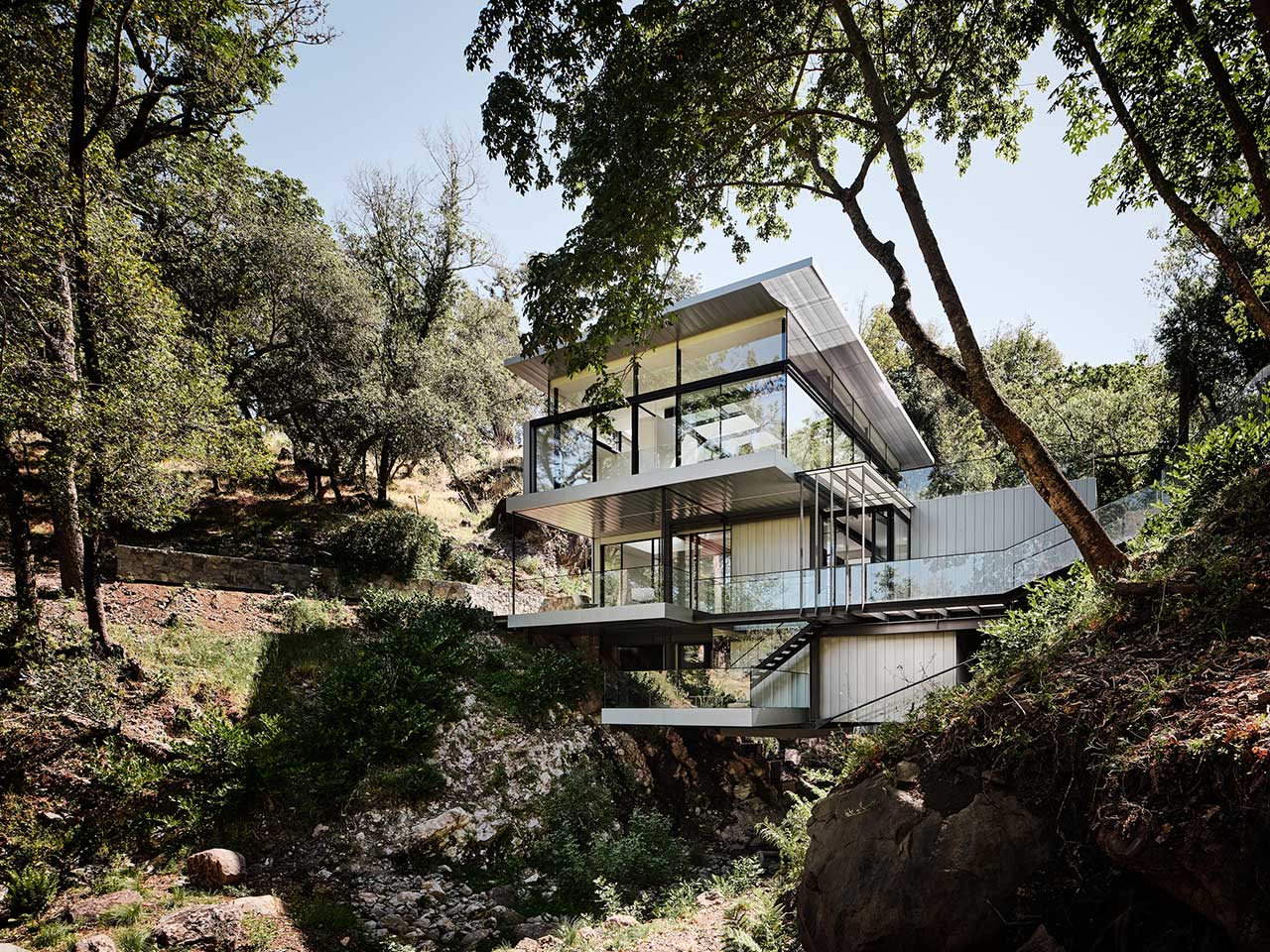 Suspension House Bridges a Creek Between California Hills