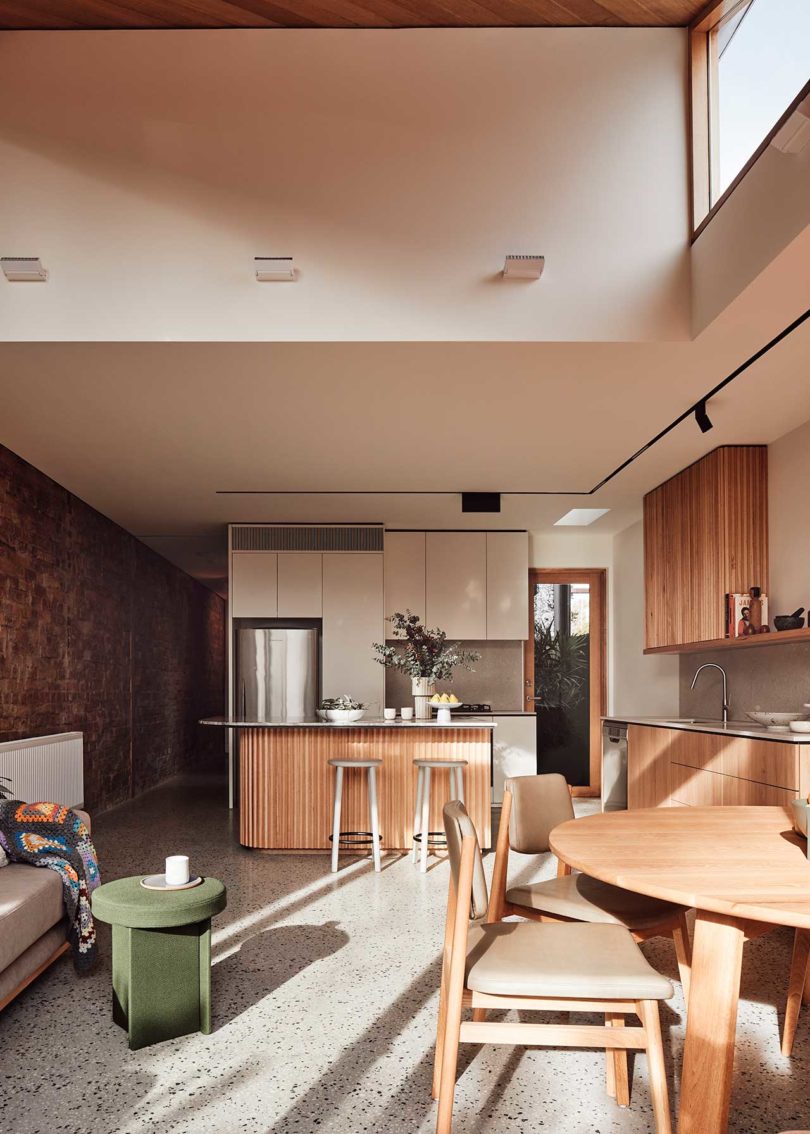 interior view of modern house with kitchen, living room, and dining area