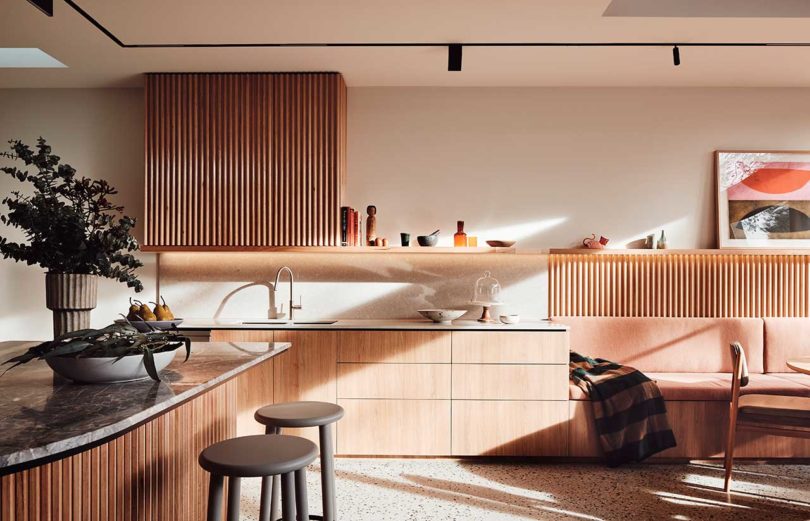 interior view of side of modern kitchen with wood cabinets