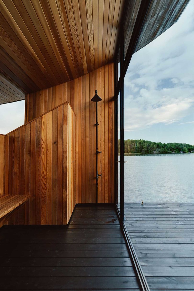 interior of modern wooden floating sauna on water