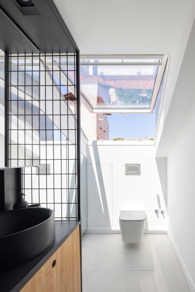 renovated modern bathroom in attic apartment