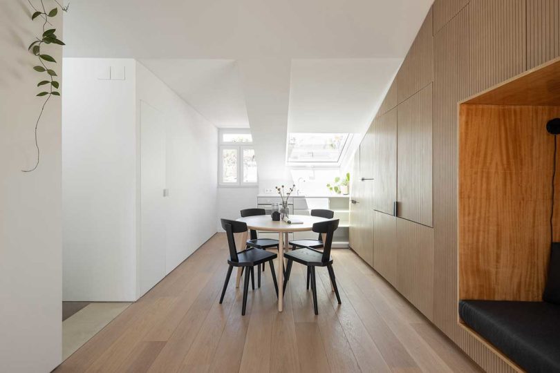 modern attic apartment view into kitchen