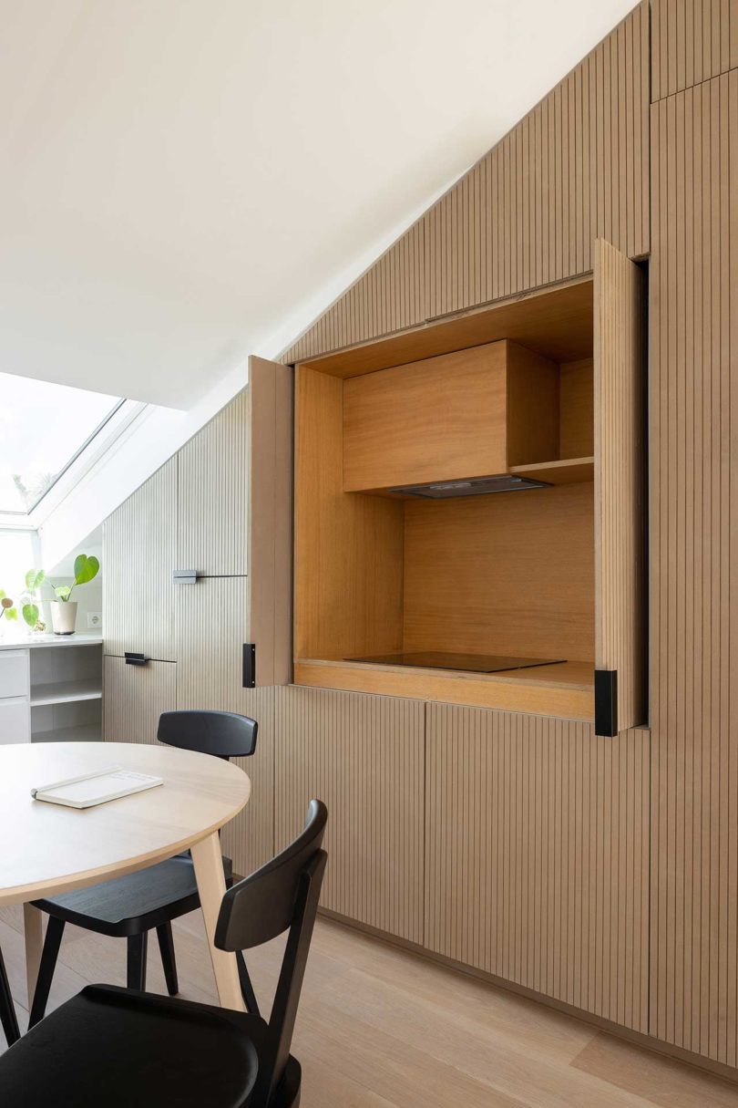 modern attic apartment view into kitchen