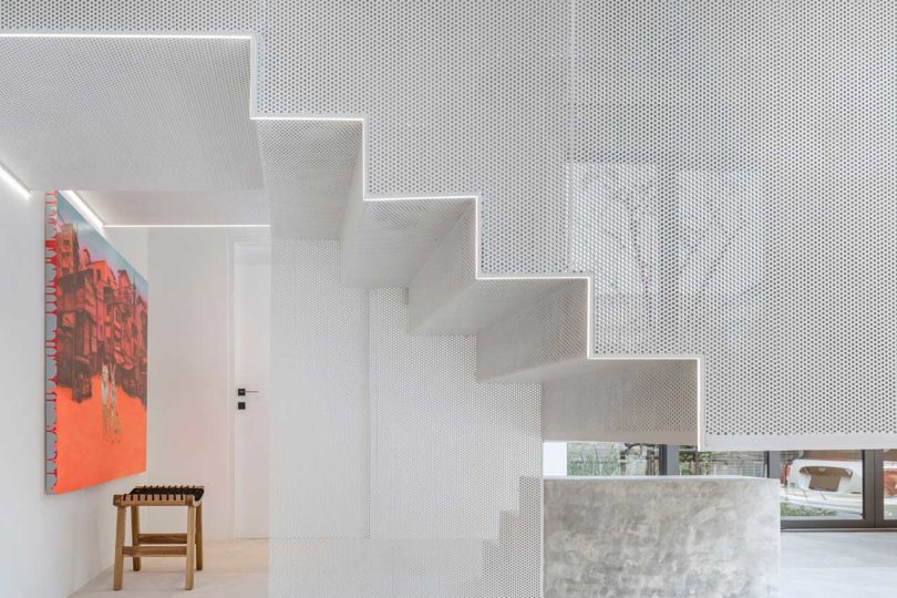 interior shot of modern home closeup of mesh enclosed staircase