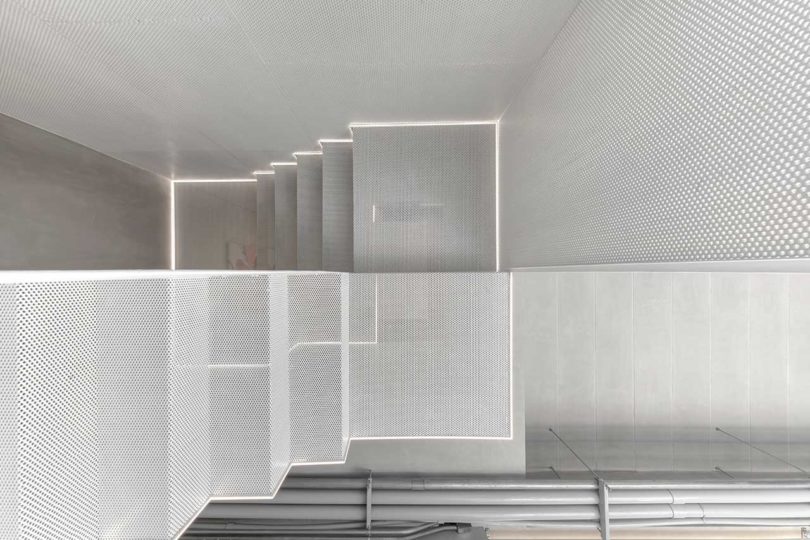 interior shot of modern home closeup of mesh enclosed staircase