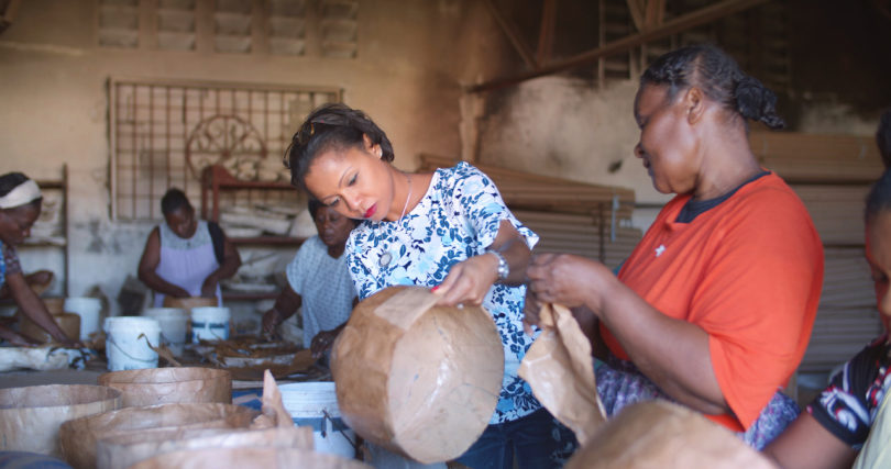 Magalie Noel Dresse with Caribbean Craft artisan