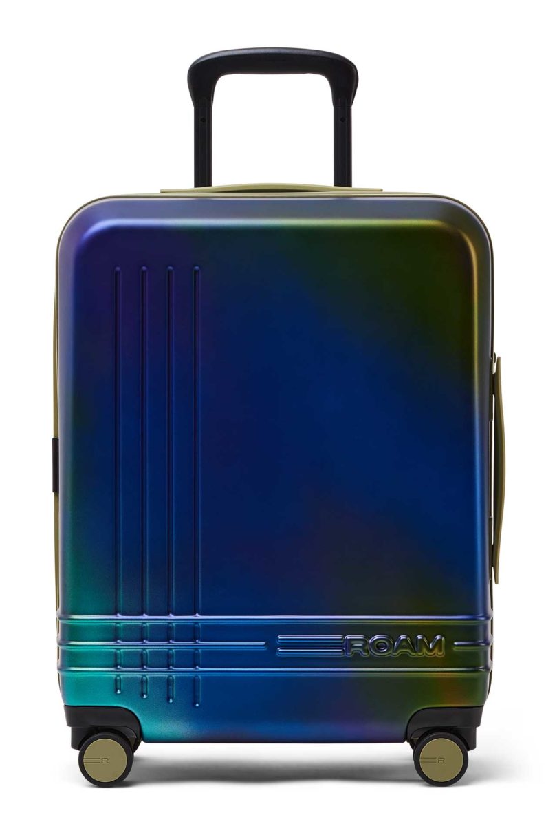 Front view of iridescent blue green suitcase