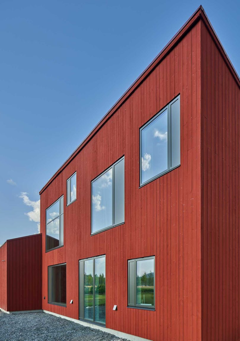 angled view of red house exterior