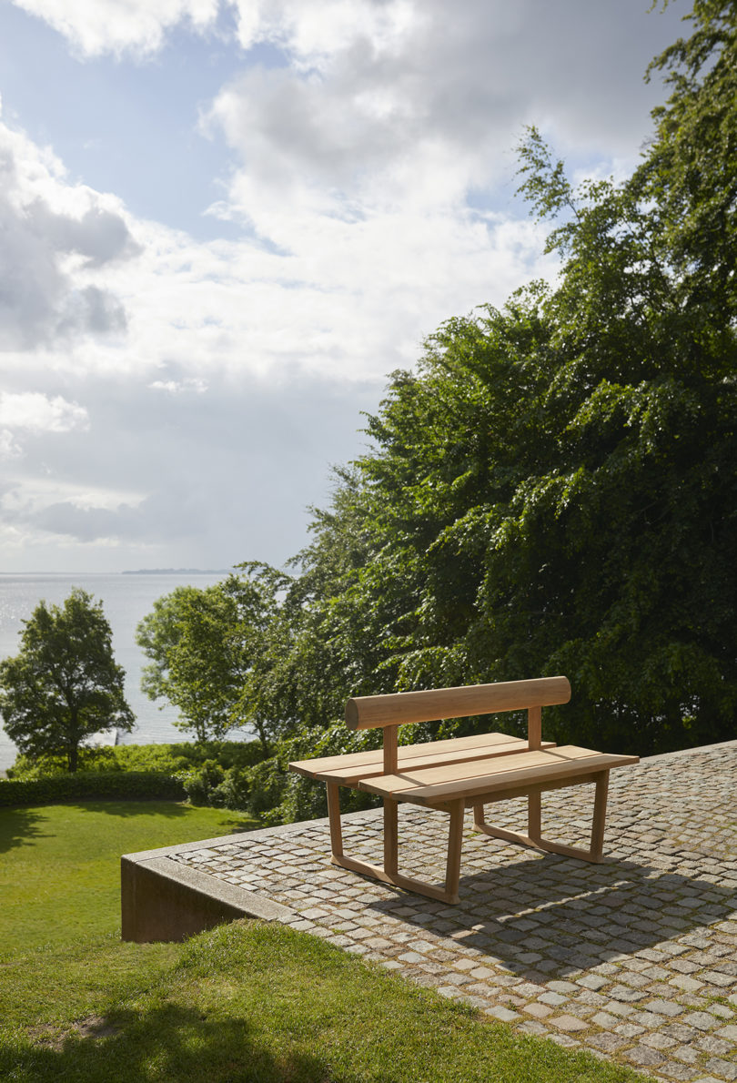 simple wooden double-sided bench in the outdoors