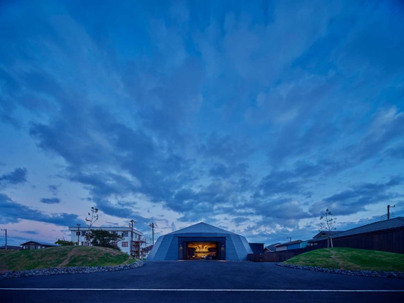 evening view of modern domed home