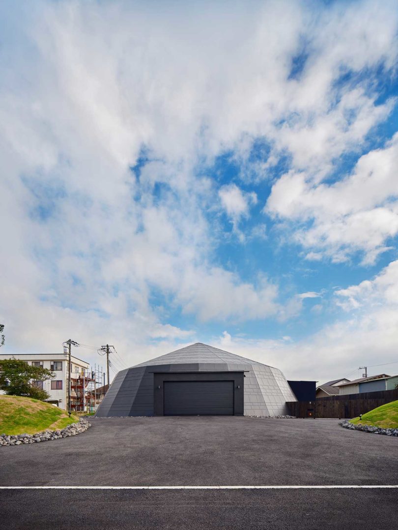 daytime exterior view of modern domed home