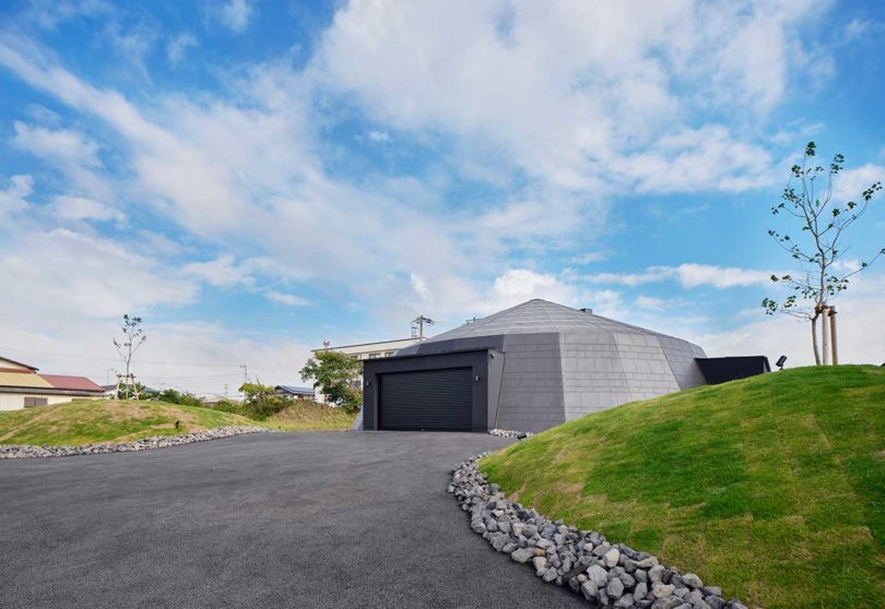 daytime exterior view of modern domed home