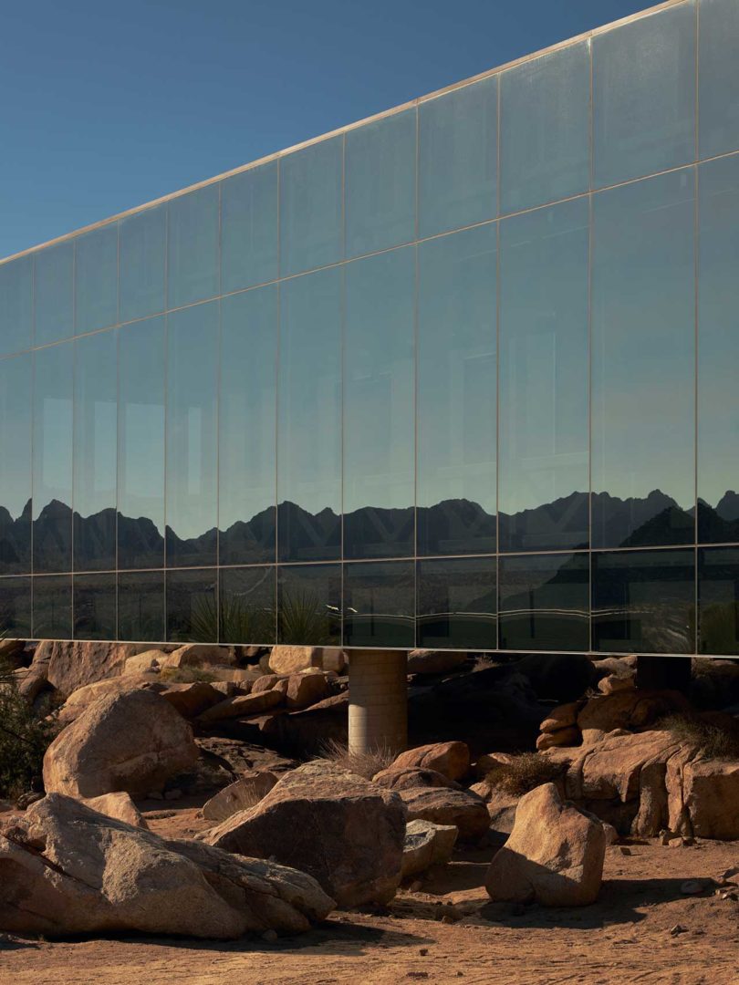 Angled exterior view of mirrored modern home