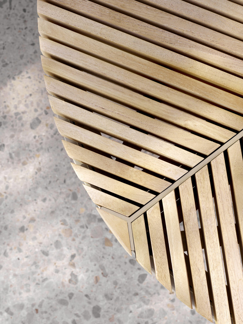 detail of round teak outdoor coffee table