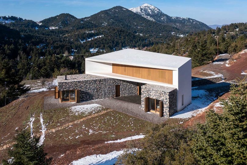 angle down view of modern mountain house with three volumes