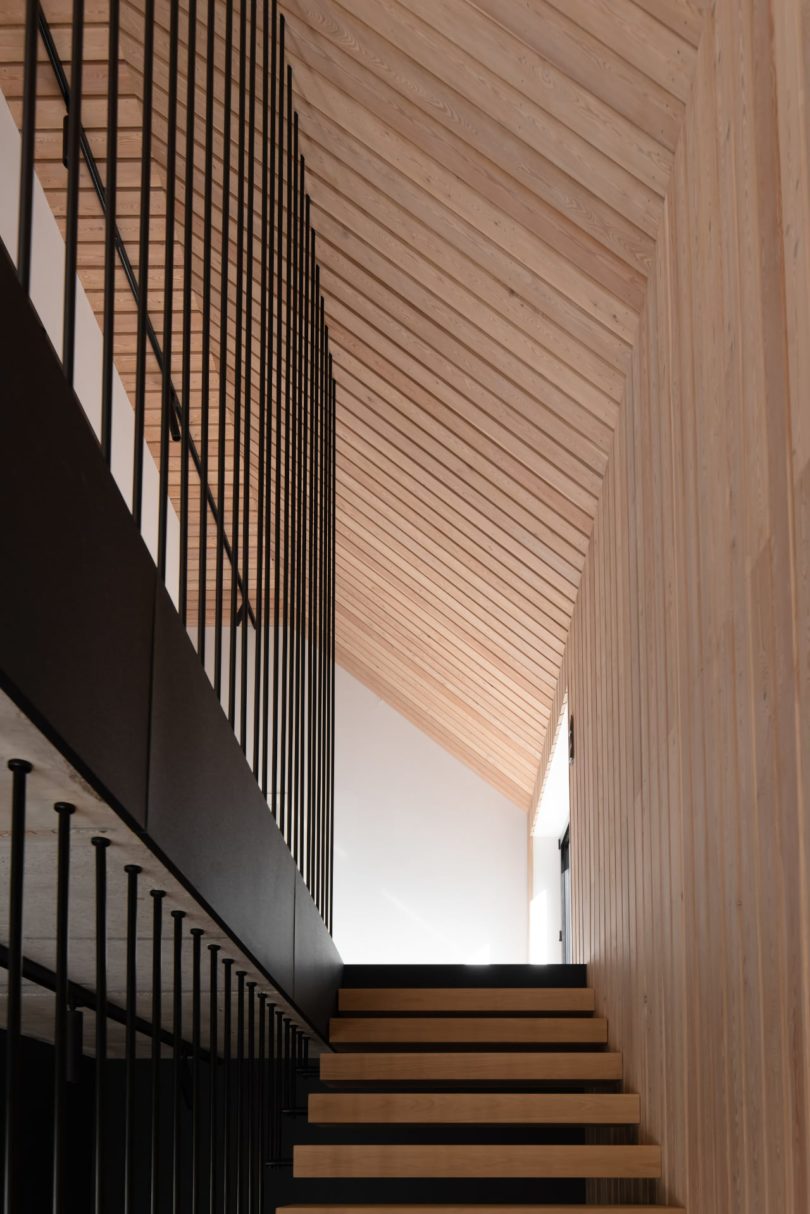 interior view looking up wood staircase