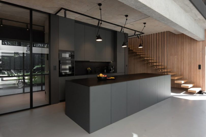 angled interior view modern black kitchen