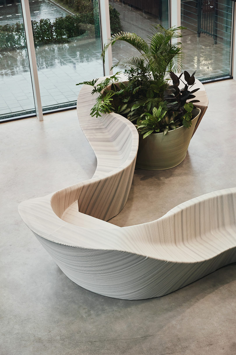 sculptural, white and grey furniture in office lobby