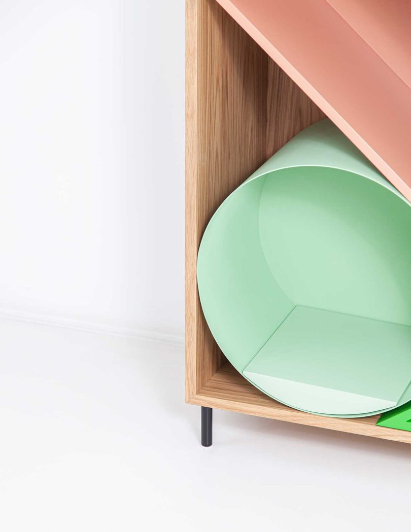 modular storage shelf with colorful geometric boxes inside