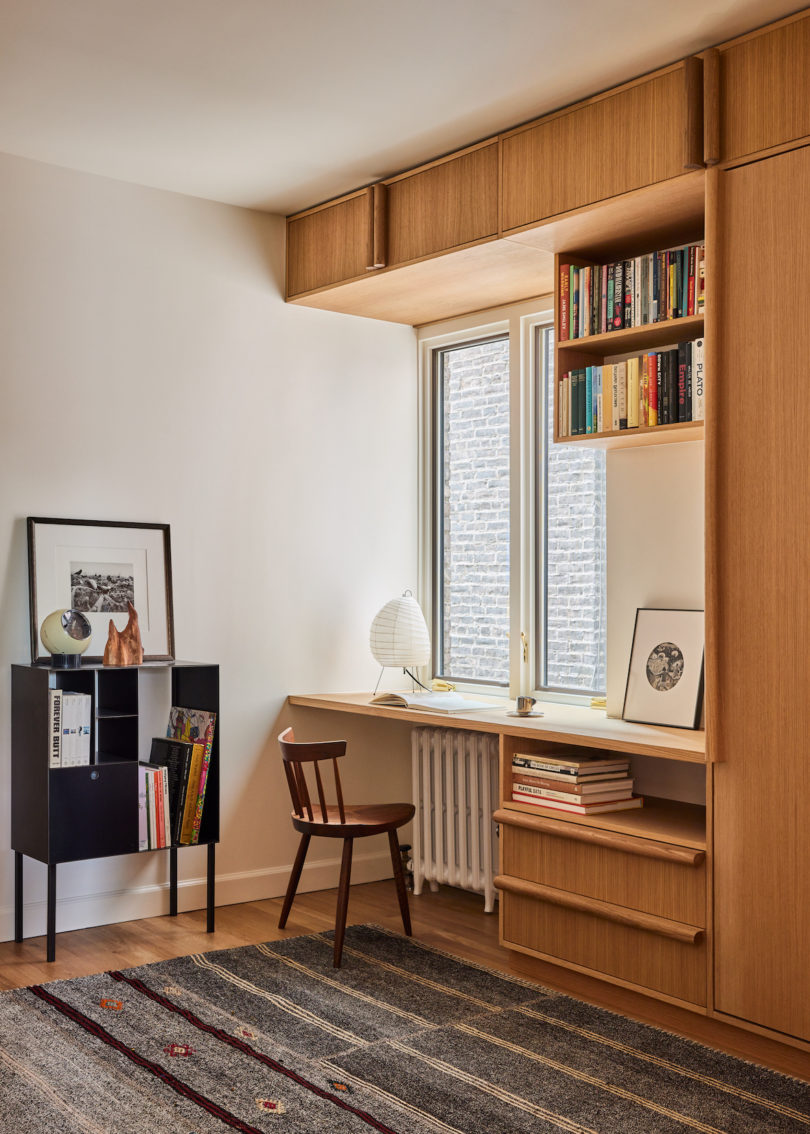 Office area with built-in custom shelving