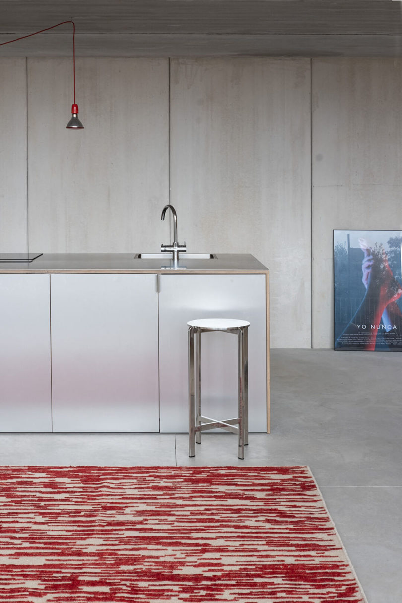 red and ivory rug in kitchen