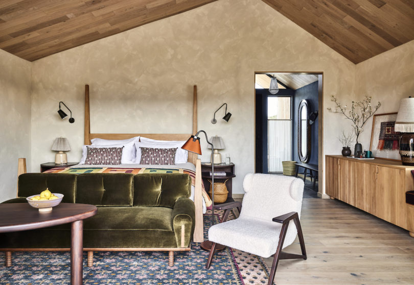 Bedroom of standalone cabin with limewashed walls