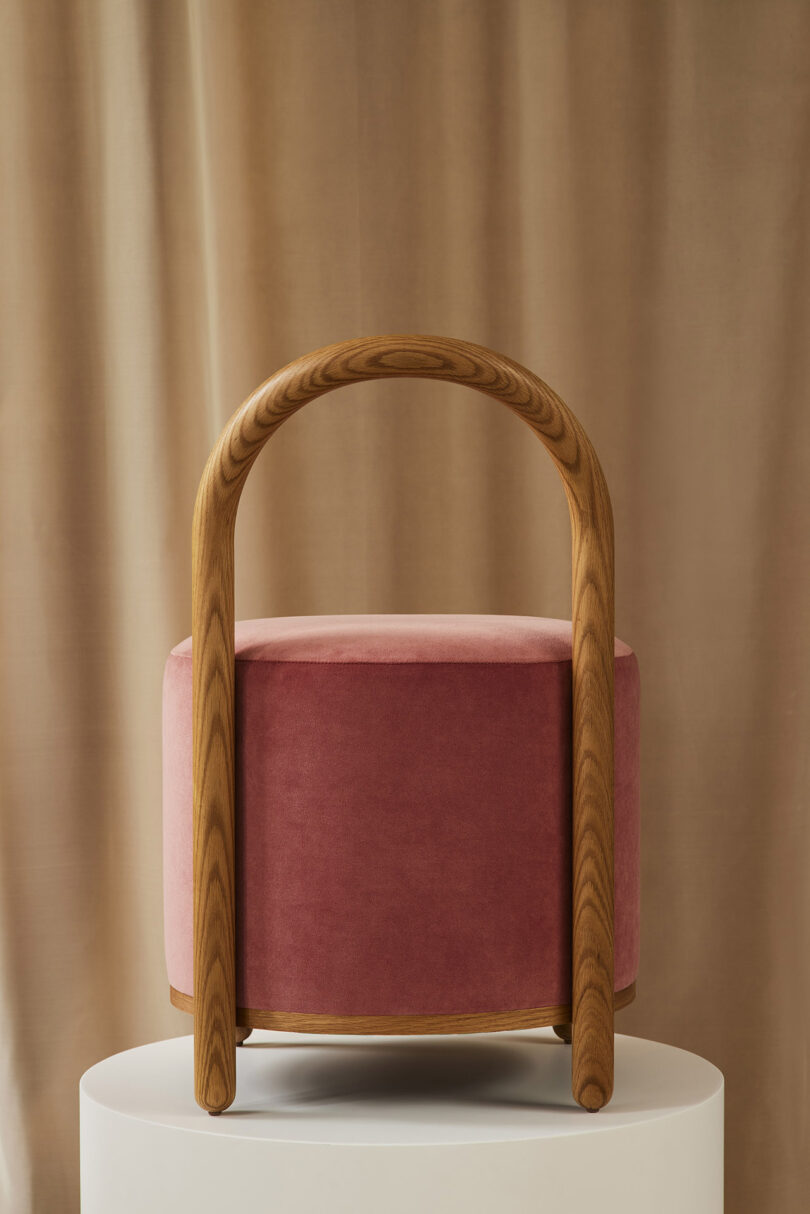 back of dark pink pouf stool