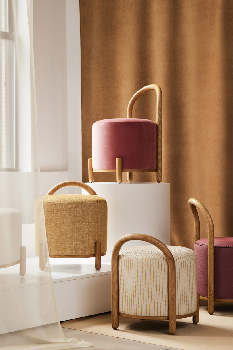 five styled pouf stools in warm tones