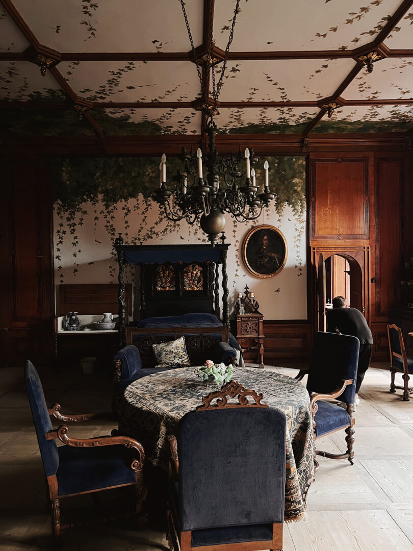 styled interior space with a round dining table and four chairs