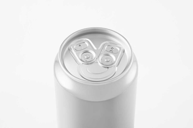 angled down view of chrome beer can with two pull tabs