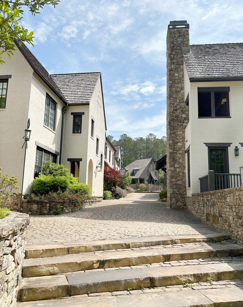 Serenbe cobbled stone pedestrian paths surrounded by buildings designed to emulate the Cotswalds.