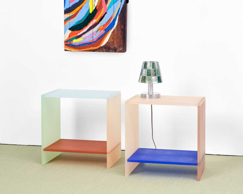 exhibition vignette with colorful abstract art and modern furniture