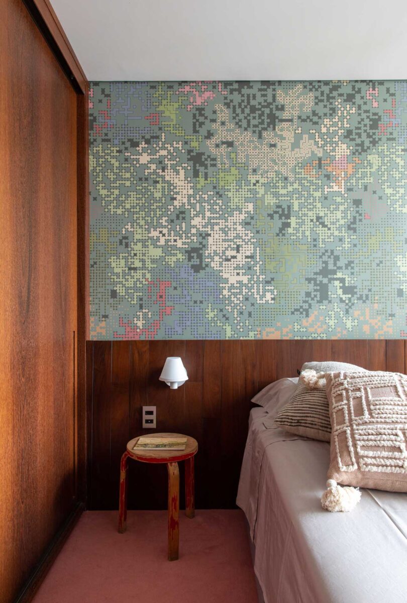 view of modern bedroom with mosaic tile wall